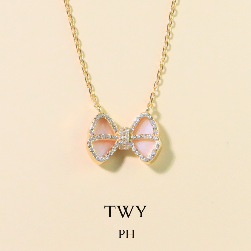 
                      
                        Tony bow necklace
                      
                    