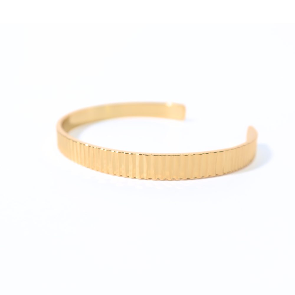 
                      
                        Eva gold bangle
                      
                    